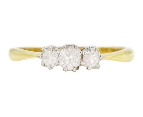 Early 20th century three stone old cut diamond ring, stamped 18ct, total diamond weight approx 0.25 caratCondition Report:App
