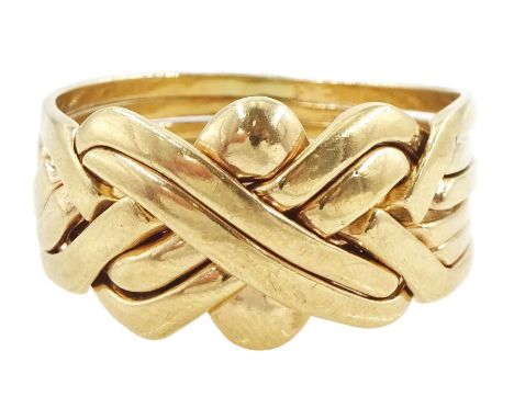 9ct gold puzzle ring, London 1990Condition Report:Approx 10.15gm, size beyond ring sizer, max depth = 13.8mm