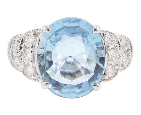 18ct white oval cut aquamarine ring, with milgrain set diamond, stepped design shoulders, stamped 750, aquamarine approx 4.55