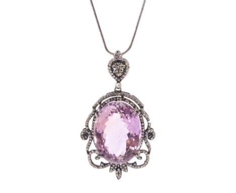 Silver oval cut amethyst and diamond, fancy openwork pendant necklace, amethyst approx 36.50 caratCondition Report:Pendant le