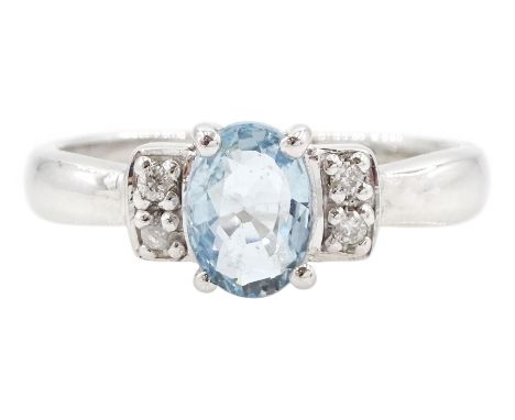 9ct white gold oval cut aquamarine ring, with two round brilliant cut diamonds set either side, hallmarked, aquamarine approx