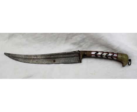 A Persian dagger, the 14cm curved fullered blade with mother of pearl handle