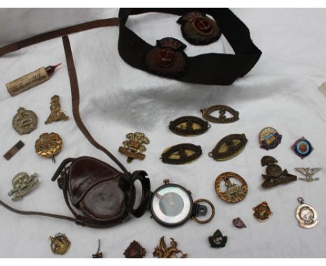 A World War I Vernier's pattern VII compass, together with cap badges, Iodine ampule  etc