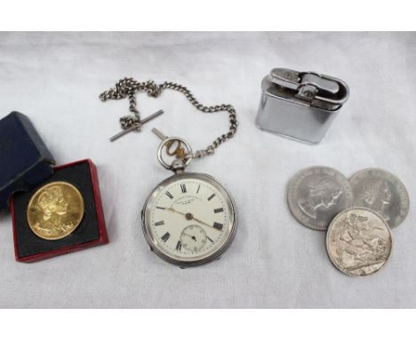 A late Victorian silver key wound open faced pocket watch, the dial with Roman numerals and a seconds subsidiary dial, inscri