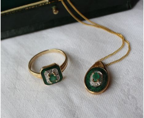 A Brooks & Bentley emerald and diamond ring, set with a central oval emerald and four diamonds  with a green enamel border in