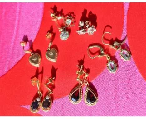 A pair of sapphire and diamond drop earrings together with garnet set earrings and other earrings