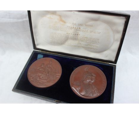 A pair of cased copper medallions produced "In commemoration of the visit of H.I.M. The German Emperor to the city of London,