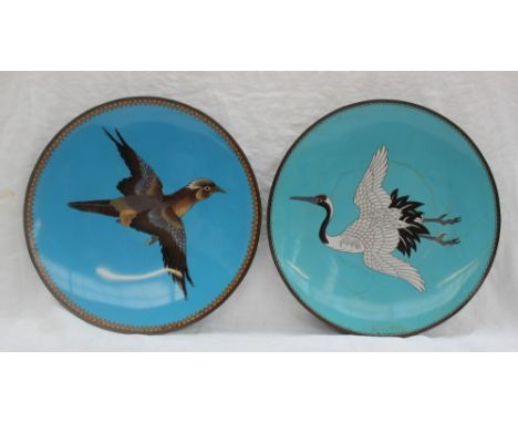 A Japanese cloisonne enamel charger decorated with a crane in flight to a turquoise ground, 30cm diameter together with anoth