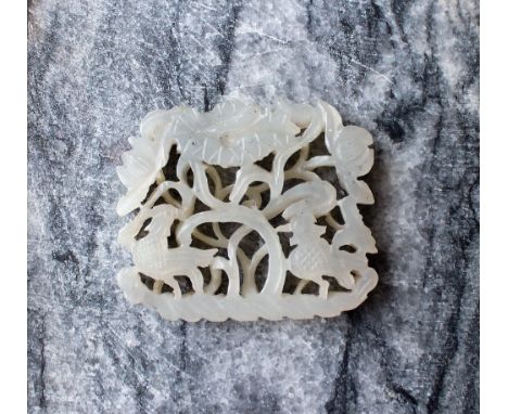 A white jade panel carved with birds and leaves, 4cm x 3.5cm CONDITION REPORT: Overall condition is good