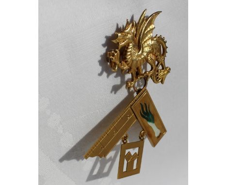 A 9ct yellow gold Masonic Past Masters Jewel, with a dragon clasp supporting a set square with enamel decorated leek, inscrib