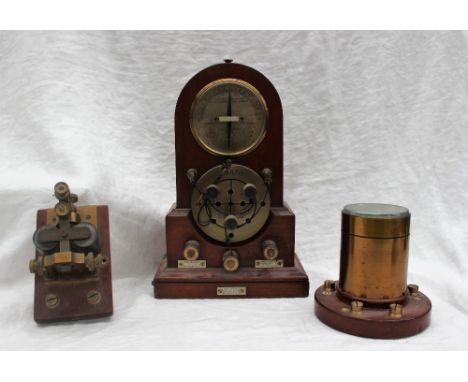 A P.O 70 Galvanometer, in a mahogany case, 30.5cm high together with a G.P.O 16098 Sounder, and a G.P.O 14673 cylinder