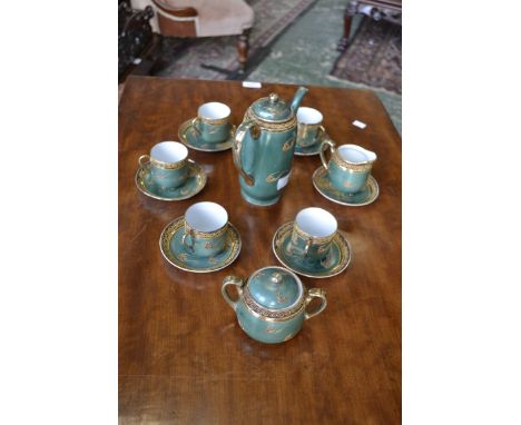 A Japanese egg shell porcelain coffee service for five including coffee pot, unmarked  
