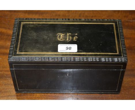 A 19th century French brass marquetry and ebonised rectangular tea caddy, hinged cover with inlaid inscription within a wavy 