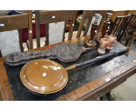 A Chinese pair of carved oak bellows; a ceramic pan; a pair of oak candlesticks etc. (6)