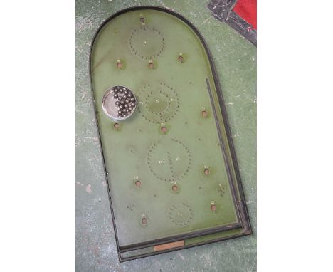 A vintage dome top bagatelle game with balls