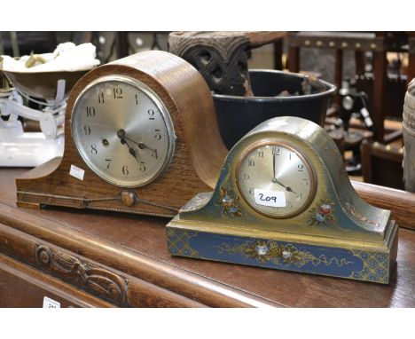 A Chinoiserie lacquer mantel clock; an oak cased mantel clock (2)
