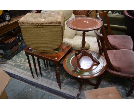 A reproduction mahogany nest of tables; a reproduction mahogany tripod table; a reproduction wine table; a Lloyd Loom style s