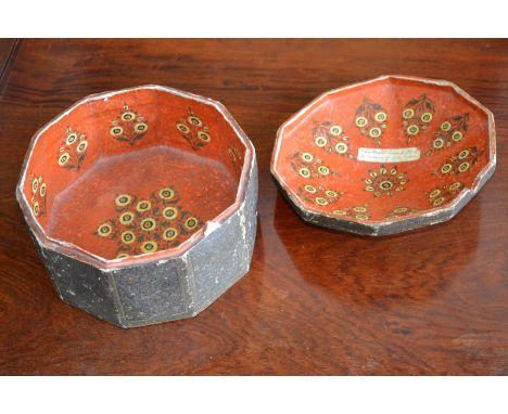 A 19th century Indian decagonal papier mâché box and cover, pressed and picked out in colours with ornate foliage in compartm