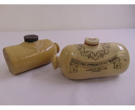 Two Doulton ceramic foot warmers of cylindrical form