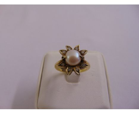 Diamond and pearl dress ring