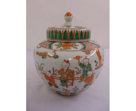 A Chinese famille verte ginger jar decorated with children playing with raised pull off cover