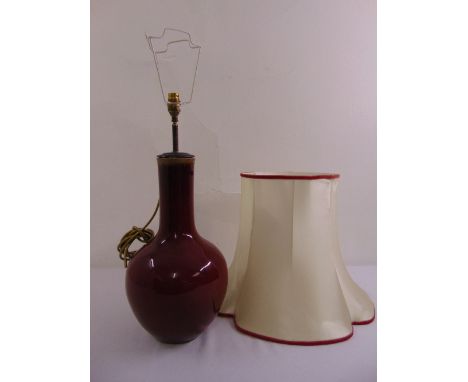 Chinese ox blood red baluster vase converted to a table lamp, to include silk shade