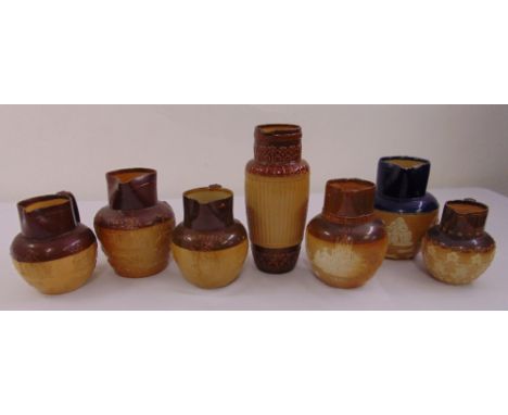 Seven Doulton Lambeth ceramic jugs, marks to the bases