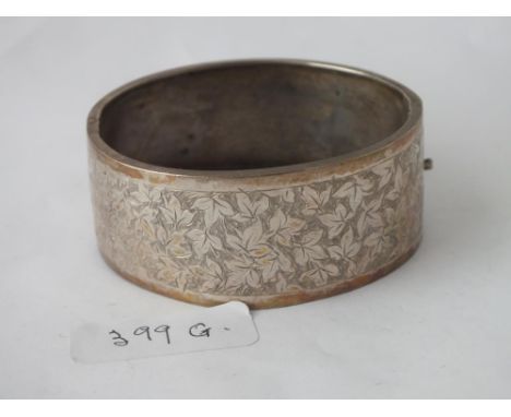 Wide silver bangle       