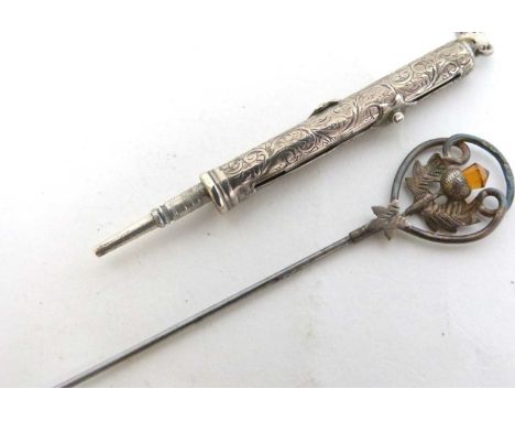 Mixed Lot: silver and citrine hat pin, the open work finial set with a Scottish thistle highlighted with a small cognac citri