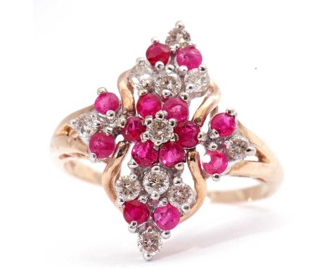 Modern ruby and diamond dress ring of marquis shape, featuring 14 small rubies and 11 small diamonds, stamped 9K, size O
