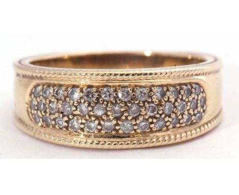 Diamond set half hoop ring set with 37 small single cut diamonds, stamped 375.9ct, size P