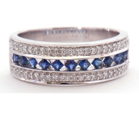 Modern 18ct gold white gold, sapphire and diamond half-hoop ring, a design featuring a row of square cut small sapphires chan