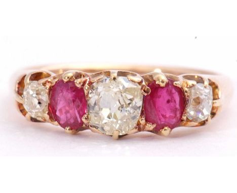 Antique ruby and diamond five stone ring, alternate set with three graduated old cut diamonds, 0.60ct total wt, and two oval 