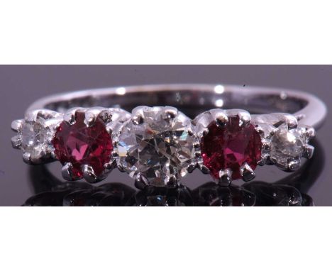 Diamond and ruby five stone ring centring a round brilliant cut diamond between alternate set round cut rubies and small diam