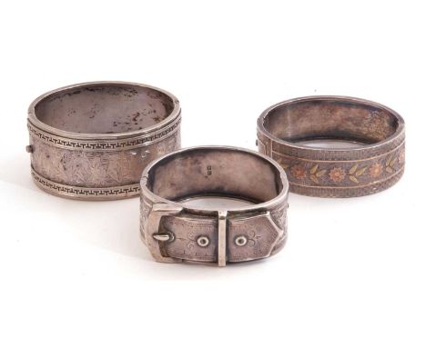 Mixed Lot: Victorian silver hinged buckle bracelet, Chester 1886 (a/f), together with two further vintage white metal bracele