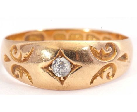 Victorian 18ct gold and single stone diamond ring, featuring a small round old cut diamond in an engraved setting between car