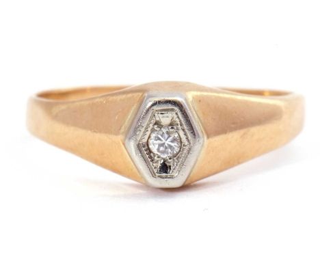 Single stone diamond ring, the small round brilliant cut diamond in an illusion lozenge shaped setting, raised between angula
