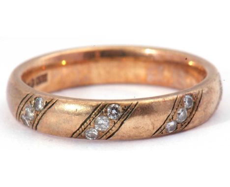 9ct gold and diamond ring featuring four small bands of diamonds, hallmarked London 1990, size M