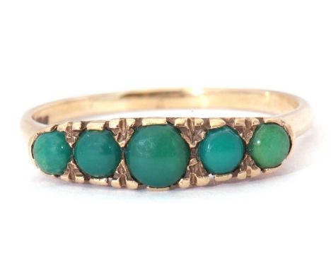 Vintage 9ct gold and turquoise ring featuring five round graduated turquoises, individually claw set in a carved gallery, siz