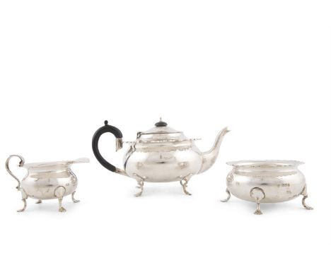A THREE PIECE SILVER TEA SET, London 1919 and 1922, mark of Charles Boyton & Son Ltd, comprising teapot, sugar bowl and cream