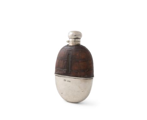 A SILVER AND CROCODILE SKIN HIP FLASK, London 1907, mark of Atkin Brothers, of oval form, the bottom half and circular hinged