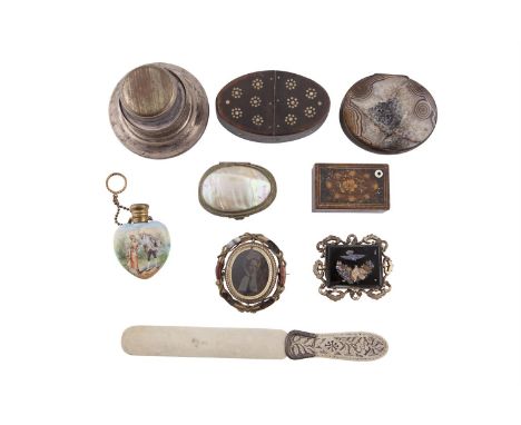 A COLLECTION INCLUDING AN INLAID BONE OVAL SNUFF BOX, 18th century, a porcelain scent flask, brooches and small boxesSold by 