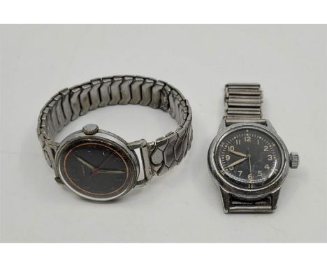 A British military stainless steel wrist watch, having black circular Arabic numeral dial, 30mm wide case stamped broad milit