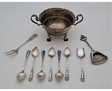 A collection of silver tableware, to include: continenetal silver flatware and british hallmarked silver sugar bowls and crea