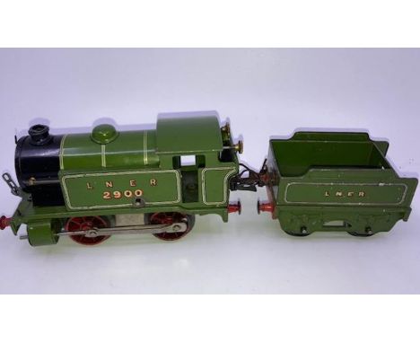 A Hornby clockwork Engine and Tender&nbsp;
