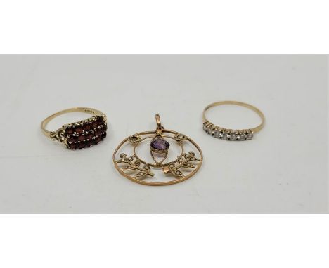 A 9ct. gold and garnet ring, set three rows of round cut garnets, with pierced shoulders, ring size UK S (gross weight 2.1g),