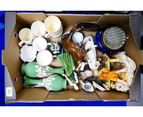 A mixed collection of ceramic items to include Capo type tramp figure, pottery lady figures , Flow blue planter , unbranded h
