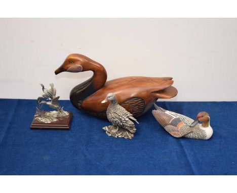 Four duck related items, including a silver filled mallard, a carved Pintail by JB Garton by Heritage Decoys, a carved wooden