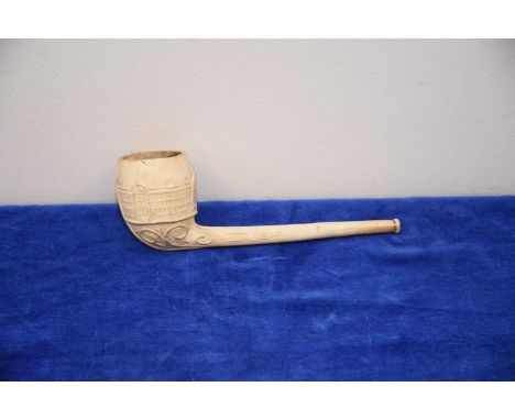 A Victorian commemorative clay pipe, 18cm, with moulded design of Crystal Palace London