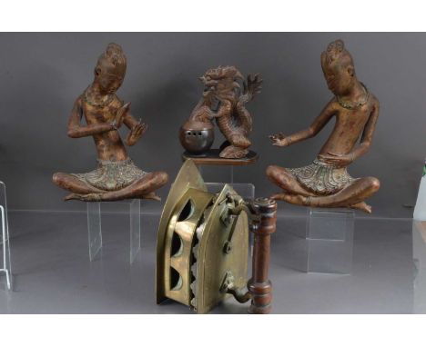 A pair of carved giltwood yoga figures together with other items, including a carved hardwood hinged smoker's item in the for
